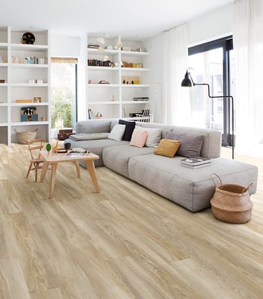 Light wood luxury vinyl flooring in living space.